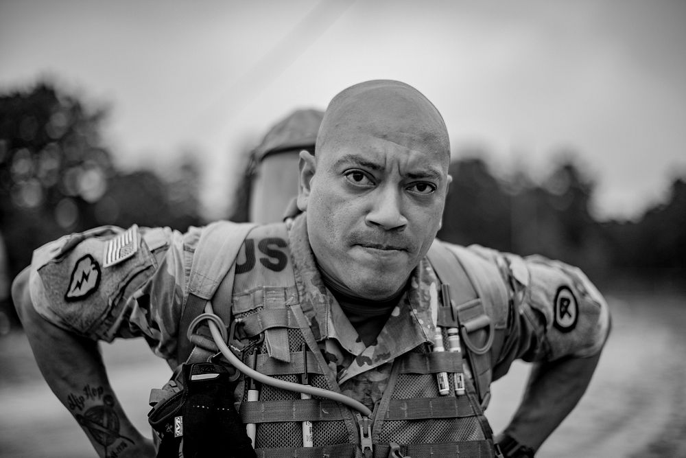 Sgt. Marcus Moore, a combat medic with HHT, 102nd Cavalry Regiment stands for a portrait during a tactical trauma care…