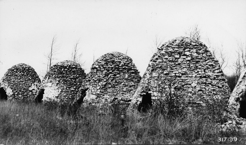 Conical charcoal kiln near Marquette, Michigan. (Forest Service photo by Hallauer). Original public domain image from Flickr