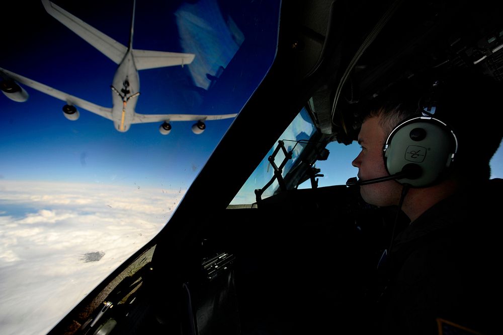 U.S. Air Force Capt. John Wicker prepares to connect to a KC-10 Stratotanker aircraft during a sortie mission over South…