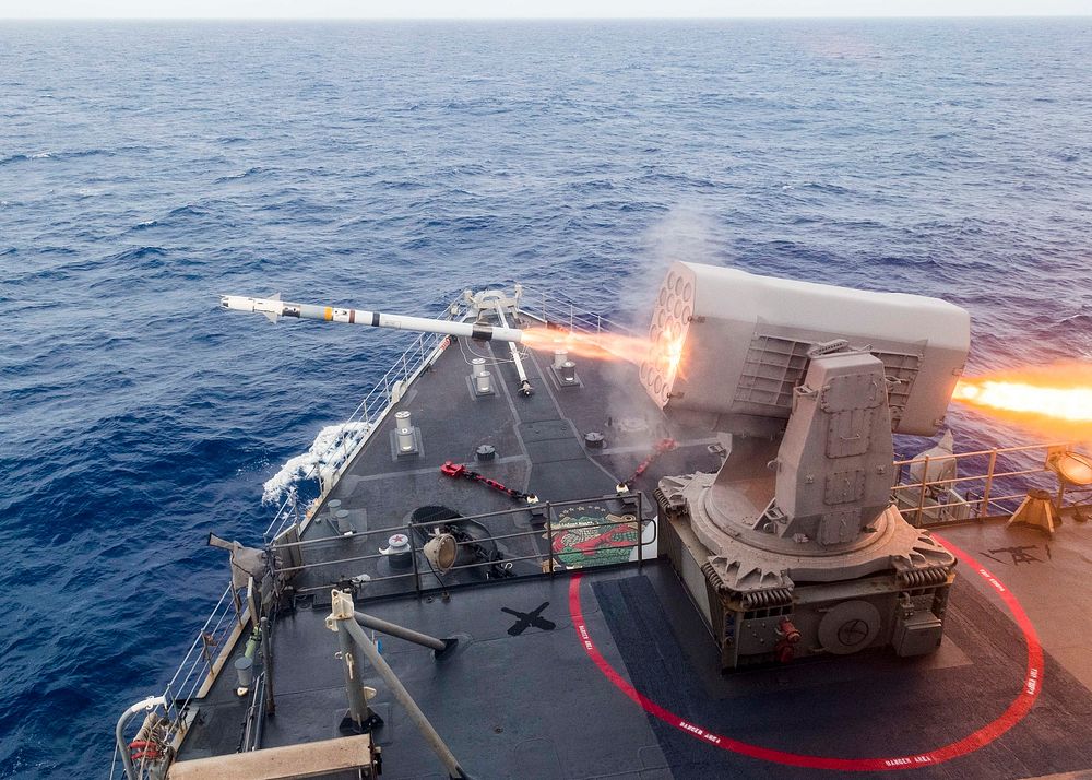 The amphibious dock landing ship USS Ashland (LSD 48) launches a Rolling Airframe Missile (RAM) during a missile exercise…