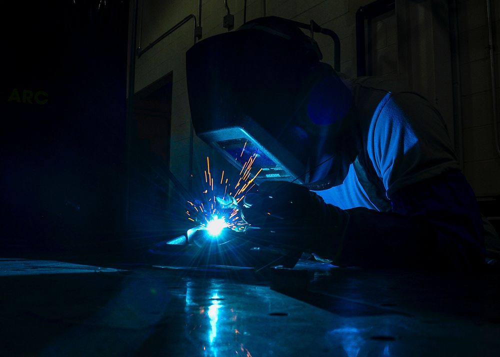 U.S. Air Force Tech. Sgt. Tyler L. Williams, of the 445th Maintenance Squadron, operates a tungsten inert gas welder at the…