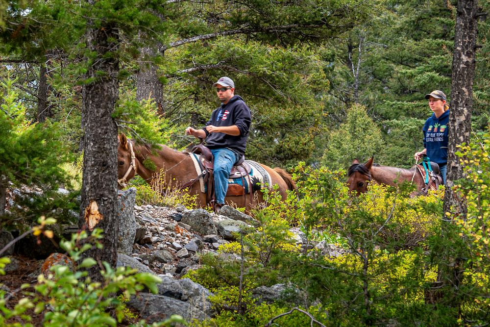 Locals ride their horses at Browns Lake at Wisdom Ranger District of Beaverhead-Deerlodge National Forest Montana, September…