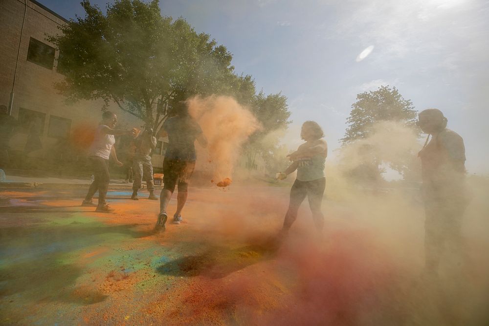 People throwing color powder. Original public domain image from Flickr