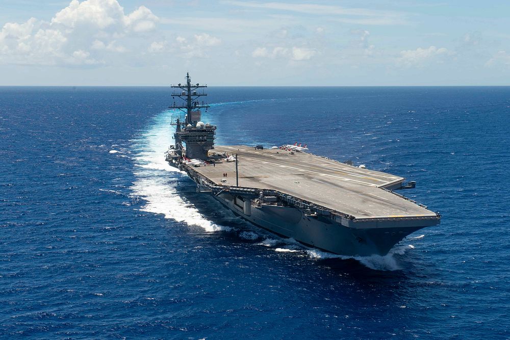 The aircraft carrier USS Dwight D. Eisenhower (CVN 69) transits the Atlantic Ocean, July 16, 2019.