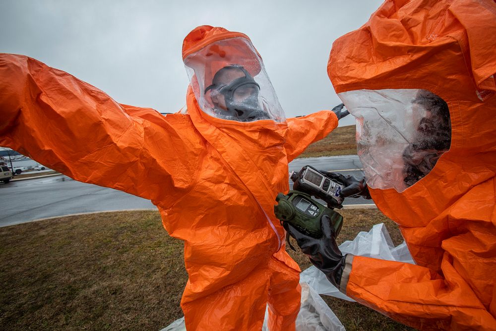 U.S. Army Sgt. Nicky Lam, left, Survey Team Member, 21st Weapons of Mass Destruction-Civil Support Team (21st WMD-CST), New…