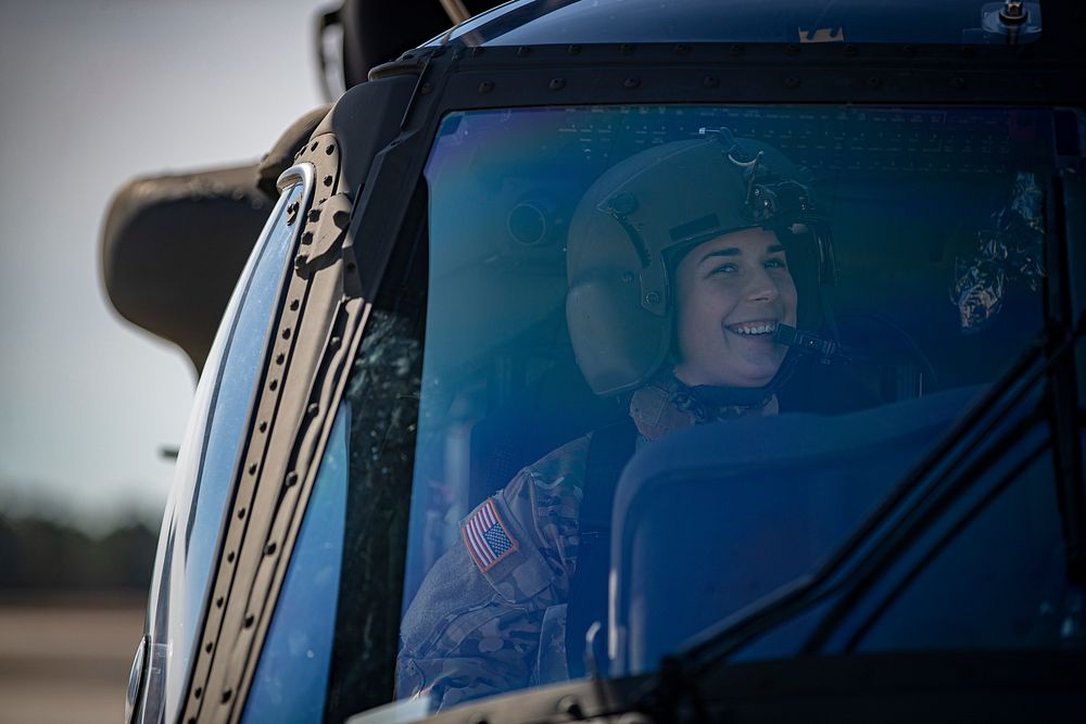 U.S. Army 1st Lt. Larissa Fluegel sits for a portrait before a flight at the Army Aviation Support Facility on Joint Base…