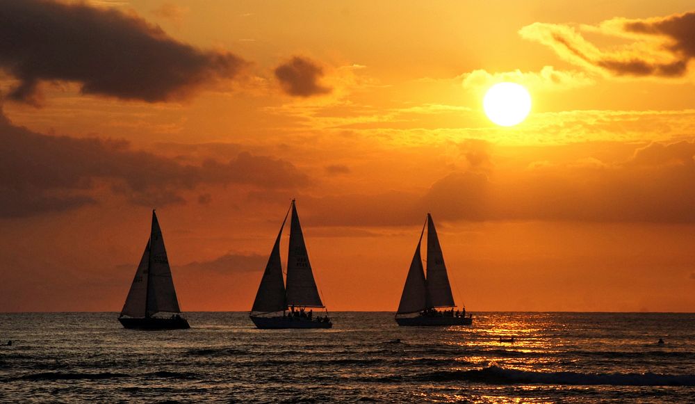 Hawaiian Sunset. Waikiki beach.One of the most well-known beaches on the planet, this 2-mile stretch of white sand and calm…