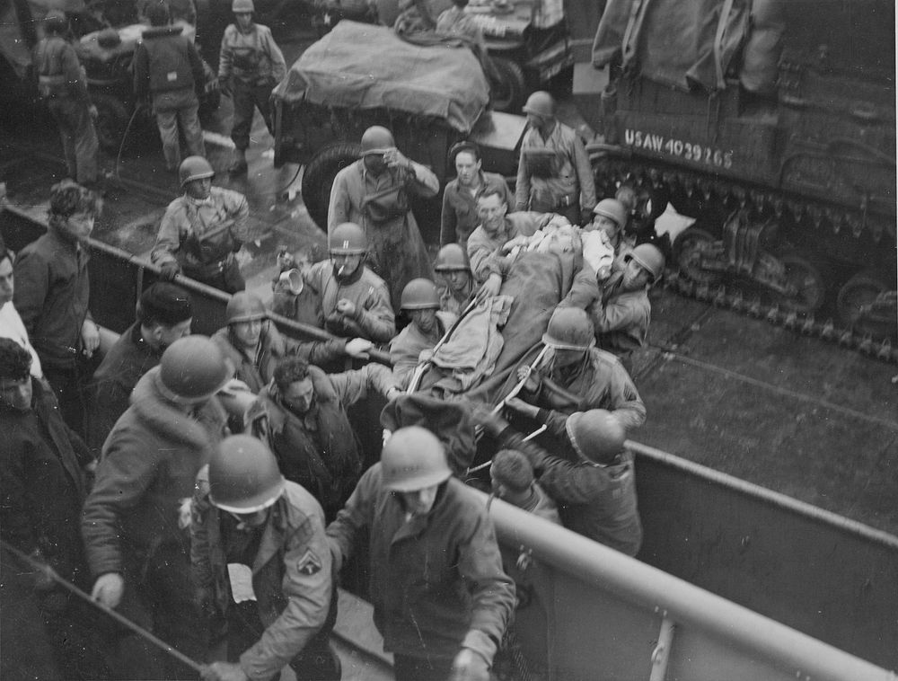 Normandy. [Litters. Transport of sick and wounded.] [Boats.] [World War 2. European Theater.] [Scene.] WWII (European…