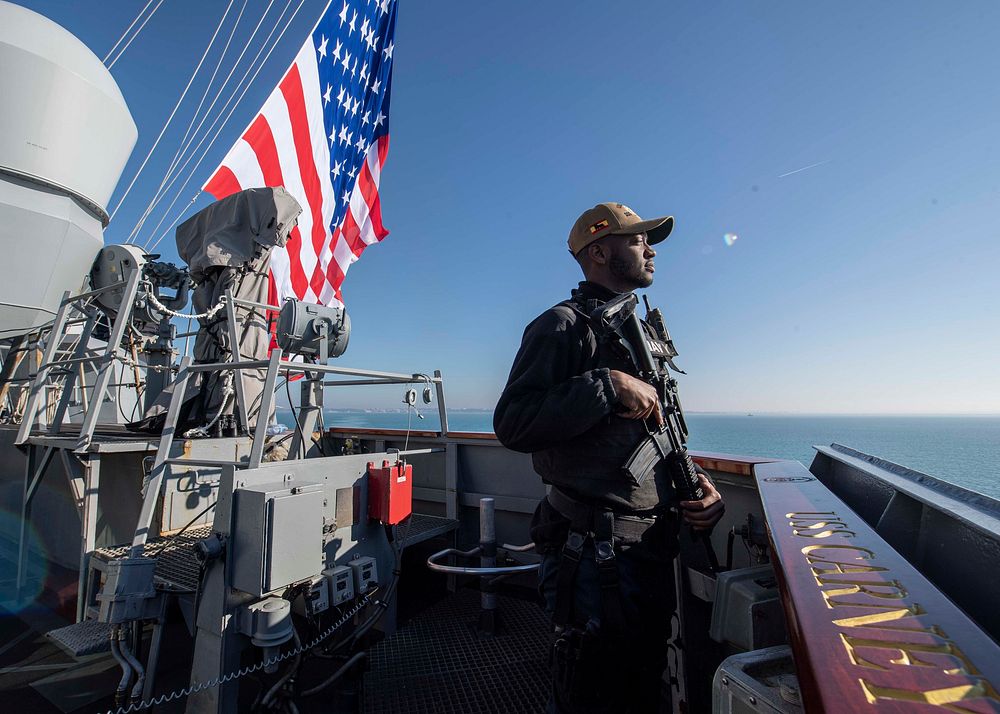 ATLANTIC OCEAN (Jan. 7, 2020) - Retail Specialist 3rd Class Darnell Thomas, from Queens, New York, stands small-craft arms…