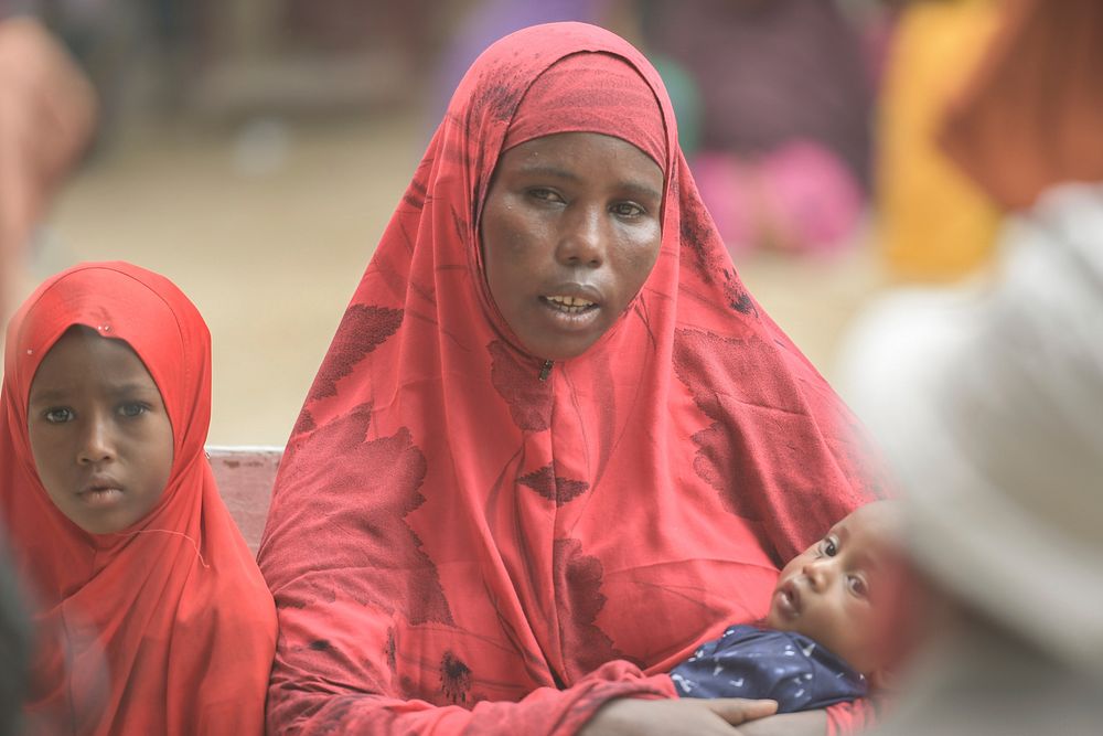 Nadifo Sirad Ali, 30, and her children awaiting their turn at the Maternal and Child Health Centre in Hamar-Jajab district…