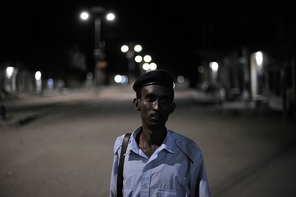 A Somali Police officer on patrol along a street during an operation in Wardhiigleey district aimed to improve security in…