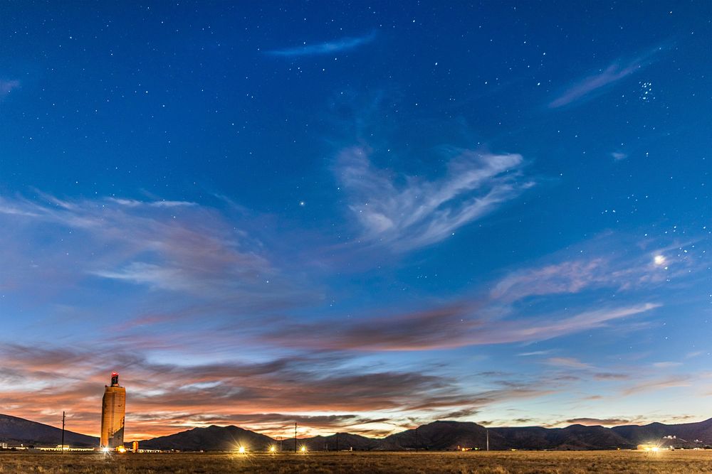 While the comet Neowise was obscured by cloud cover, photojournalist Randy Montoya took this nighttime photo of Sandia…