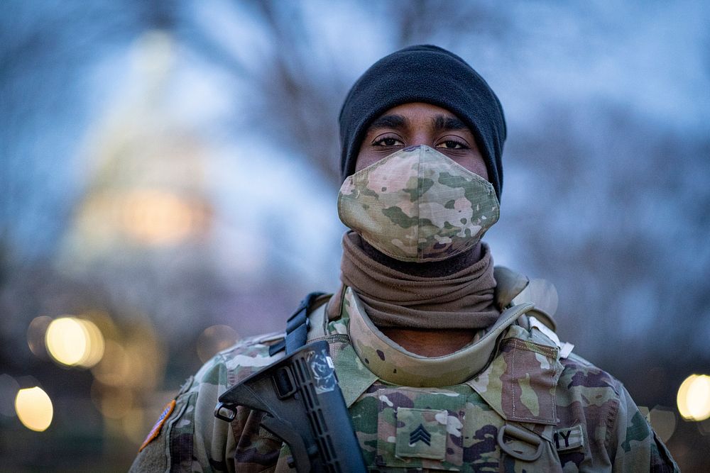 U.S. Army Sgt. Mitchell Ford, with the 2nd Battalion, 103rd Cavalry Regiment, Virginia National Guard, stands at a security…