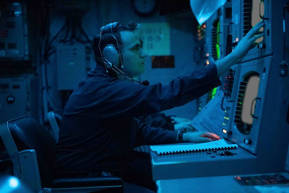 BLACK SEA (Feb. 3, 2021) Sonar Technician (Surface) 3rd Class Nicholas Llamas checks a console for acoustic readings aboard…