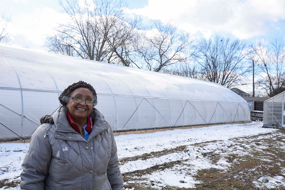Aster Bekele, the founder of The Felege Hiywot Center in Indianapolis, Indiana, stand by the center's high tunnel that was…