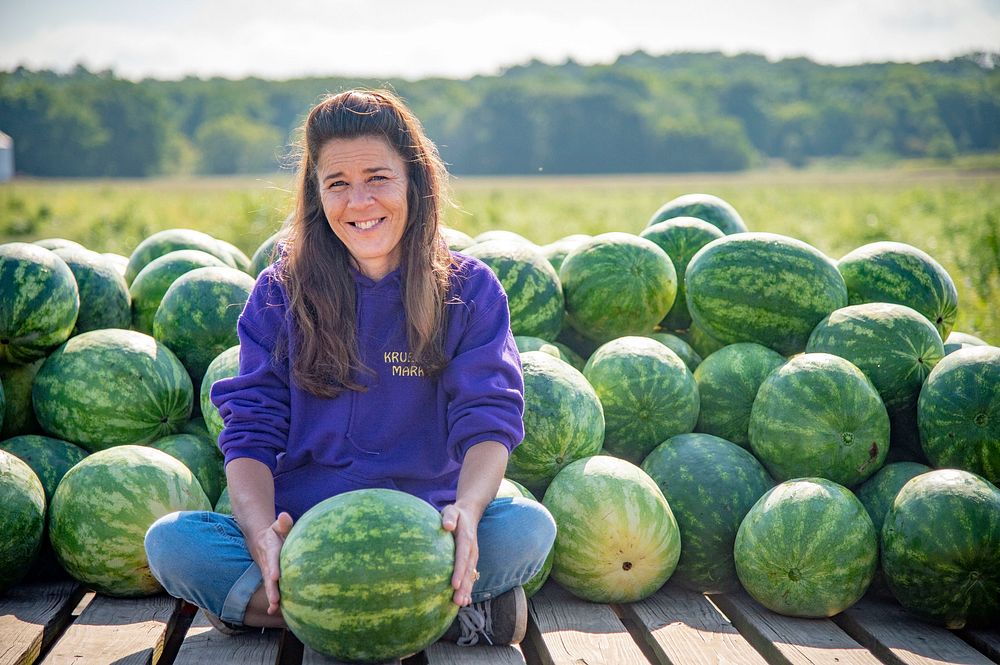 Sheena Krueger supervises workers harvest 40 acres of watermelons from the Krueger Farm outside of Letts, Iowa.