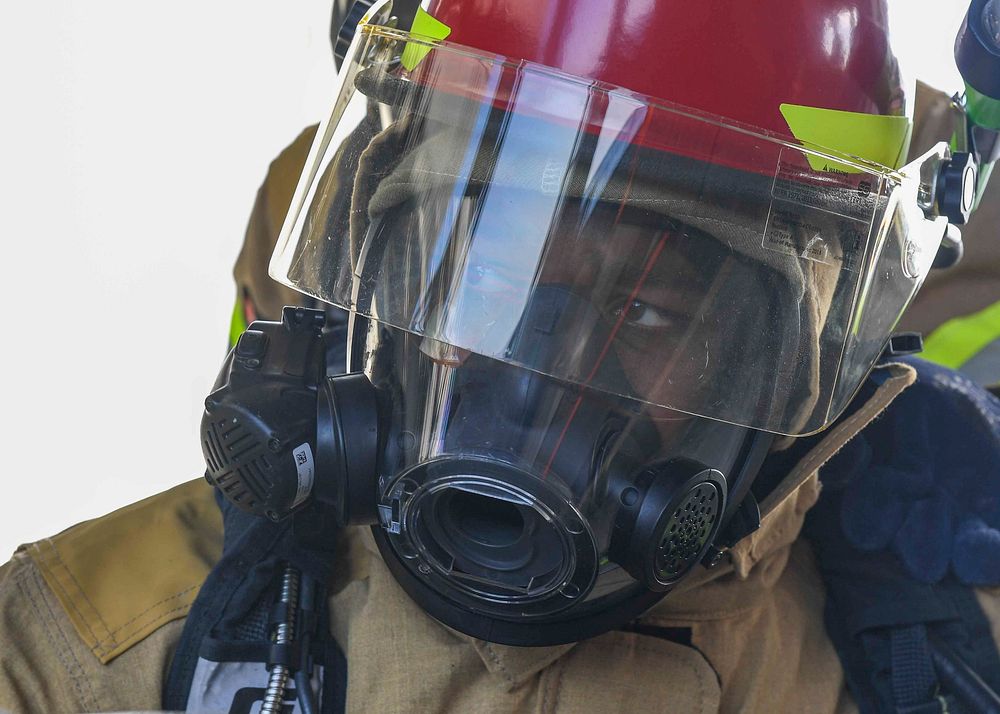 MEDITERRANEAN SEA (Mar. 26, 2021) Seaman Marcus Sweat simulates fighting a fire during a crash and salvage drill aboard the…