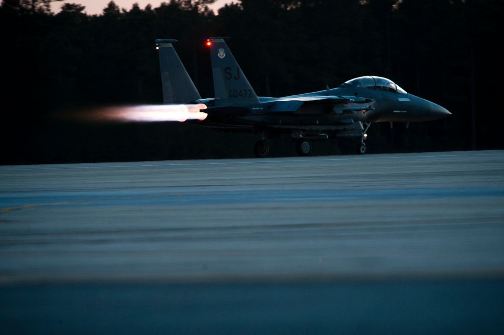 A U.S. Air Force F-15E Strike Eagle aircraft from the 336th Fighter Squadron, 4th Operations Group takes off during a local…