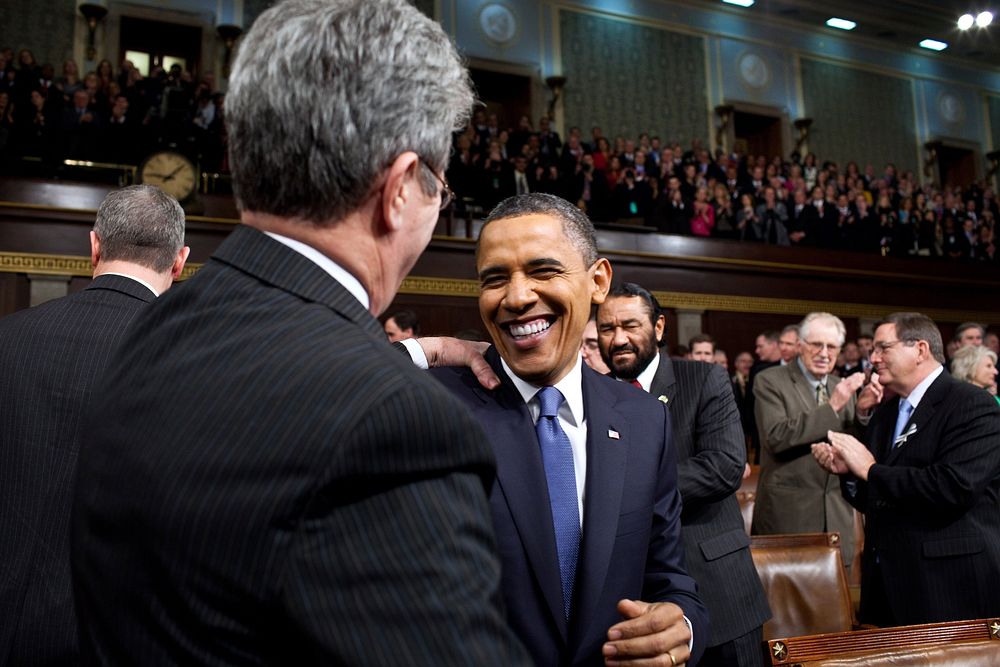 President Barack Obama greets Sen. Tom Coburn, R-Okla., as he enters the House Chamber at the U.S. Capitol in Washington…