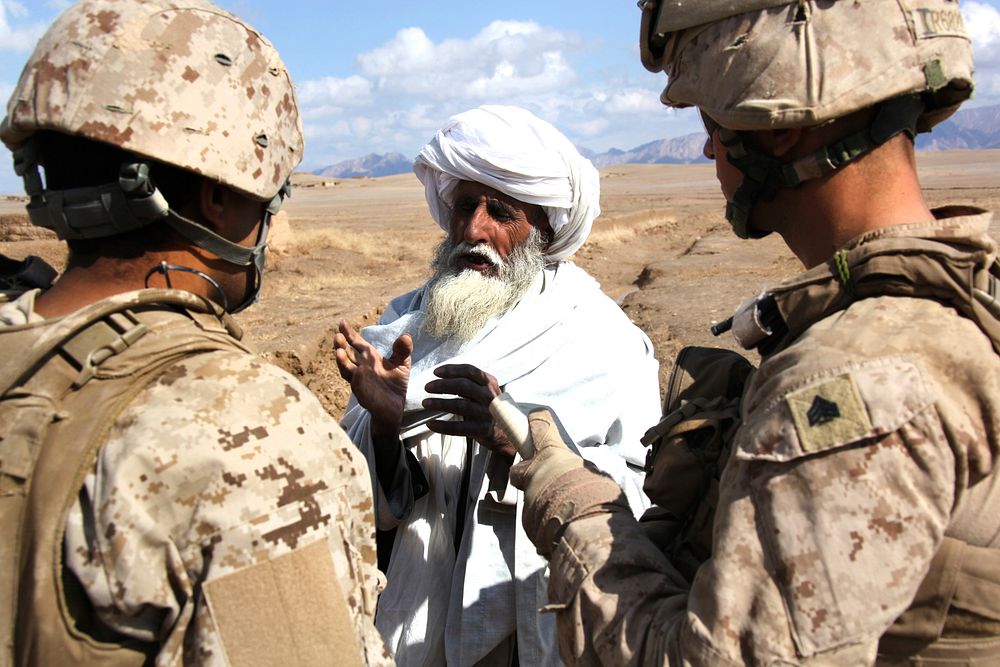 Marines speak to locals in Aghanistan
