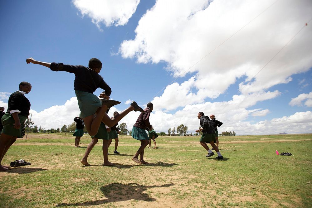 School kids playing on the field after school!. Original public domain image from Flickr