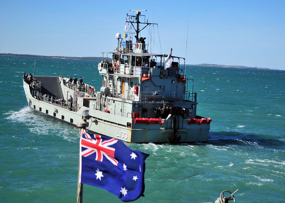 110613-N-ZF681-095 Darwin, Australia (June 13, 2011) The Royal Australian Navy Class Landing Craft Heavy (LCH) departs…