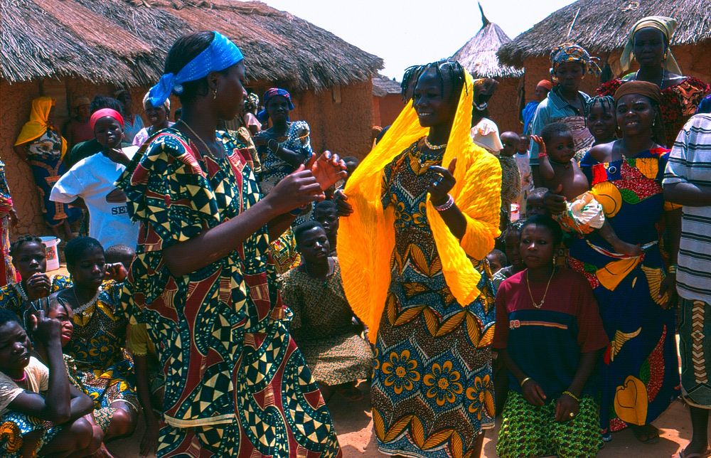 Local people dancing together. Original public domain image from Flickr