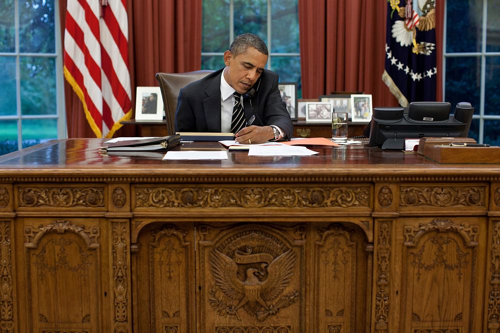 President Barack Obama talks with Texas Gov. Rick Perry to express his concern for citizens of that state impacted by the…