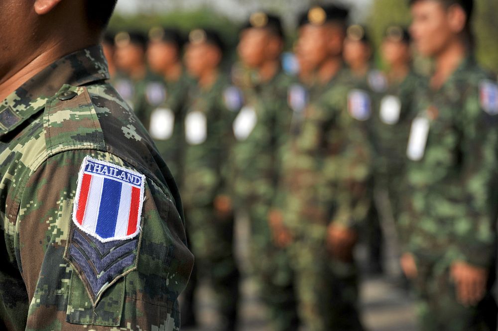 Soldiers with the Royal Thai Army stand in formation during a rehearsal for the opening ceremonies of Exercise Shanti Doot…