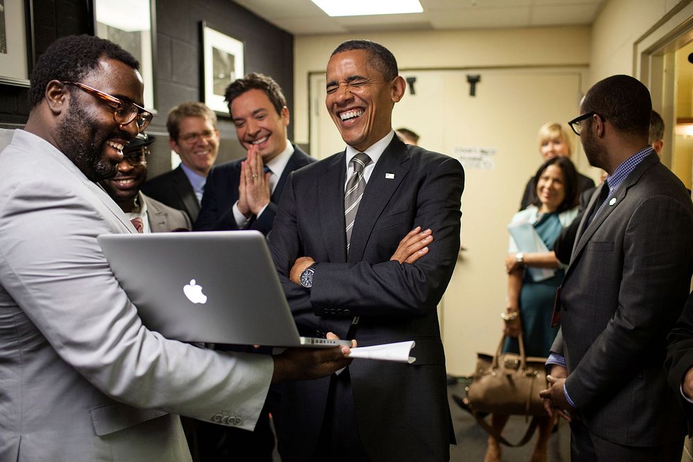 President Barack Obama and Jimmy Fallon laugh while being briefed on the "Slow Jam the News" segment backstage before taping…