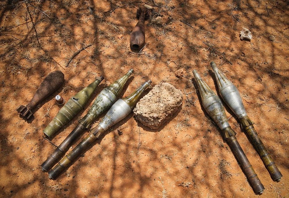Unexploded ordinance including rocket propelled grenades and mortar shells. Original public domain image from Flickr