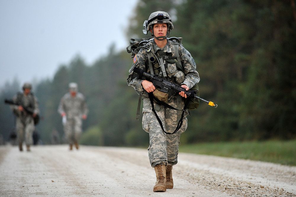 U.S. Army medic performs a road march