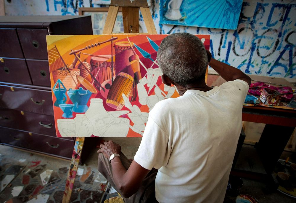 A Somali artist works in the Centre for Research and Dialogue (CRD) art studio in the Wadajir District of the Somali capital…