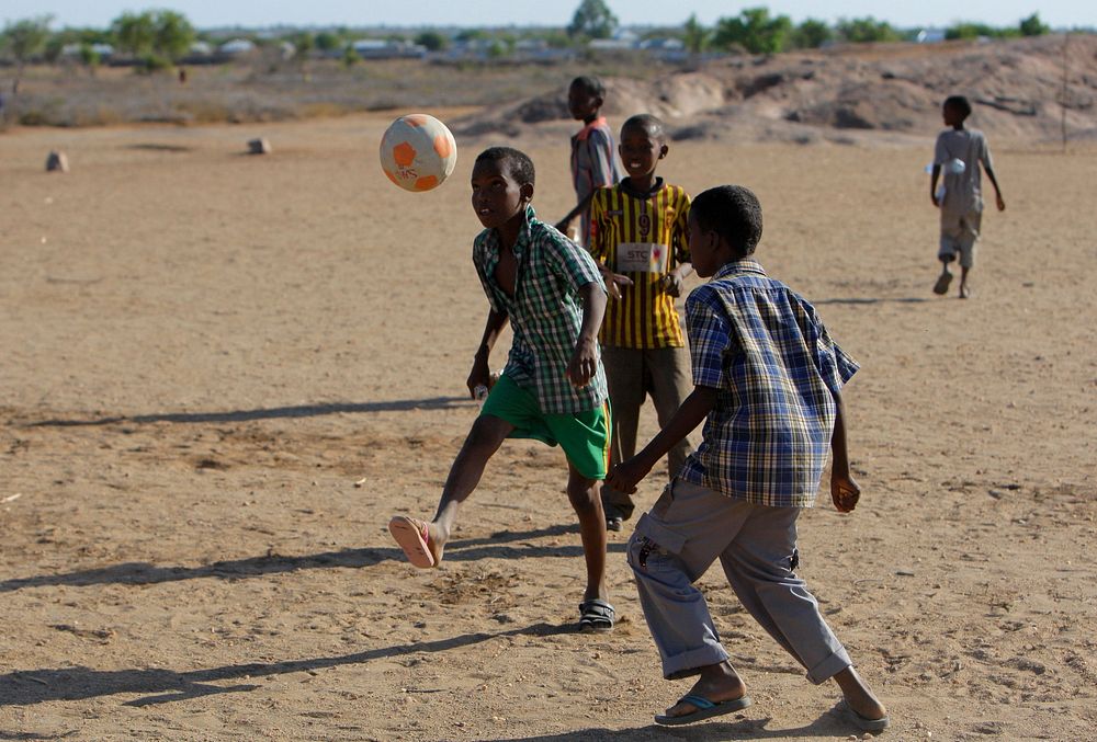 Young Somali boys play football in the central Somali town of Buur-Hakba following it's capture the day before from the Al…