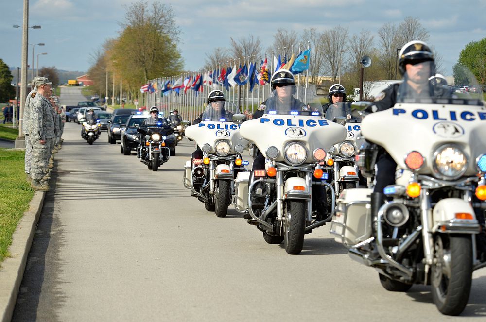 Law enforcement officers escort the remains of U.S. Army Staff Sgt. Christopher M. Ward April 12, 2013, at McGhee Tyson Air…