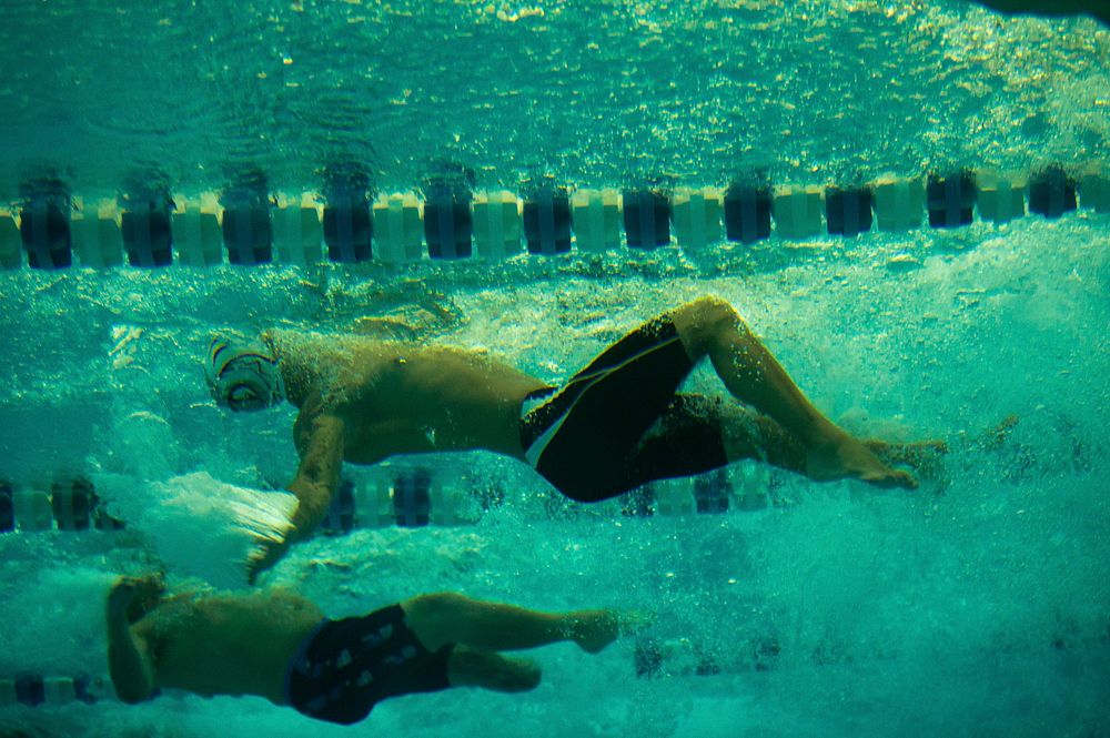 Swimmers compete in the men’s 50-meter backstroke at the 2013 Warrior Games in Colorado Springs, Colo., May 16, 2013.