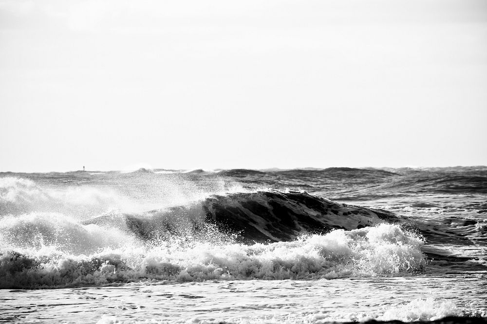 Ocean wave in black and white. Original public domain image from Flickr