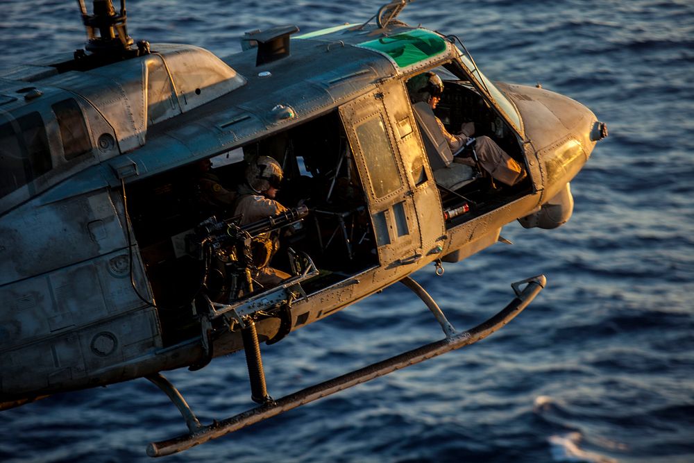 A U.S. Marine Corps UH-1N Huey helicopter assigned to Marine Medium Tiltrotor Squadron (VMM) 266 (Reinforced), 26th Marine…