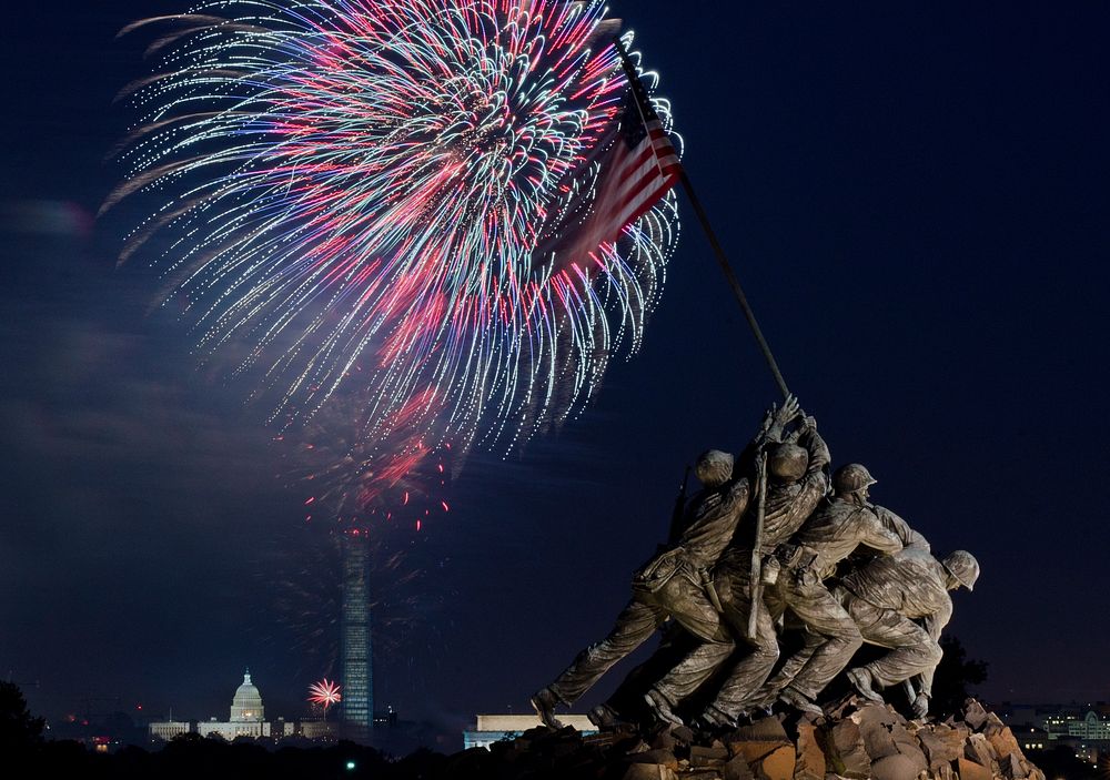 Independence Day celebration fireworks are seen from the Iwo Jima, U.S. Marine Corps Memorial in Arlington, VA on Jul. 4…