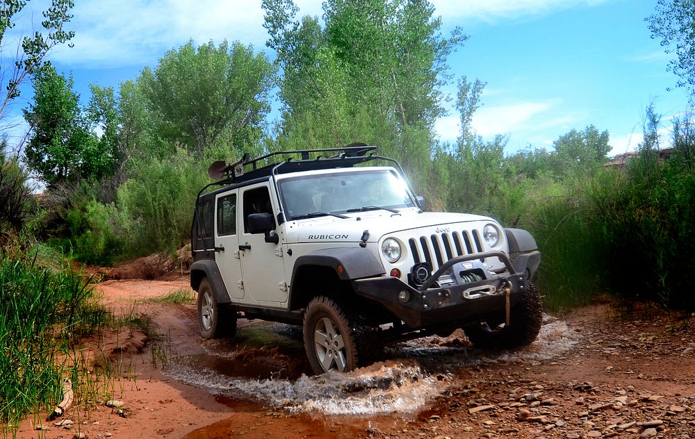 Car driving off road. (NPS photo by Kirsten Kearse). Original public domain image from Flickr