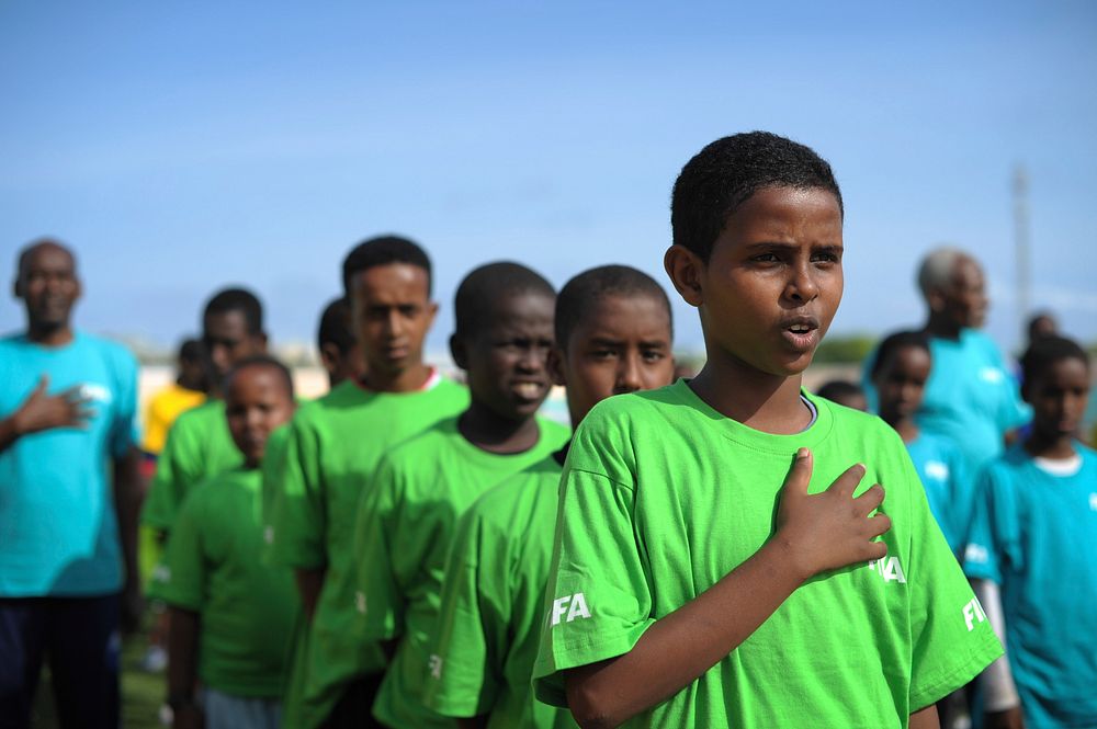 Children sing the national anthem before the start of the FIFA Football Festival in Mogadishu, Somalia, on August 19.