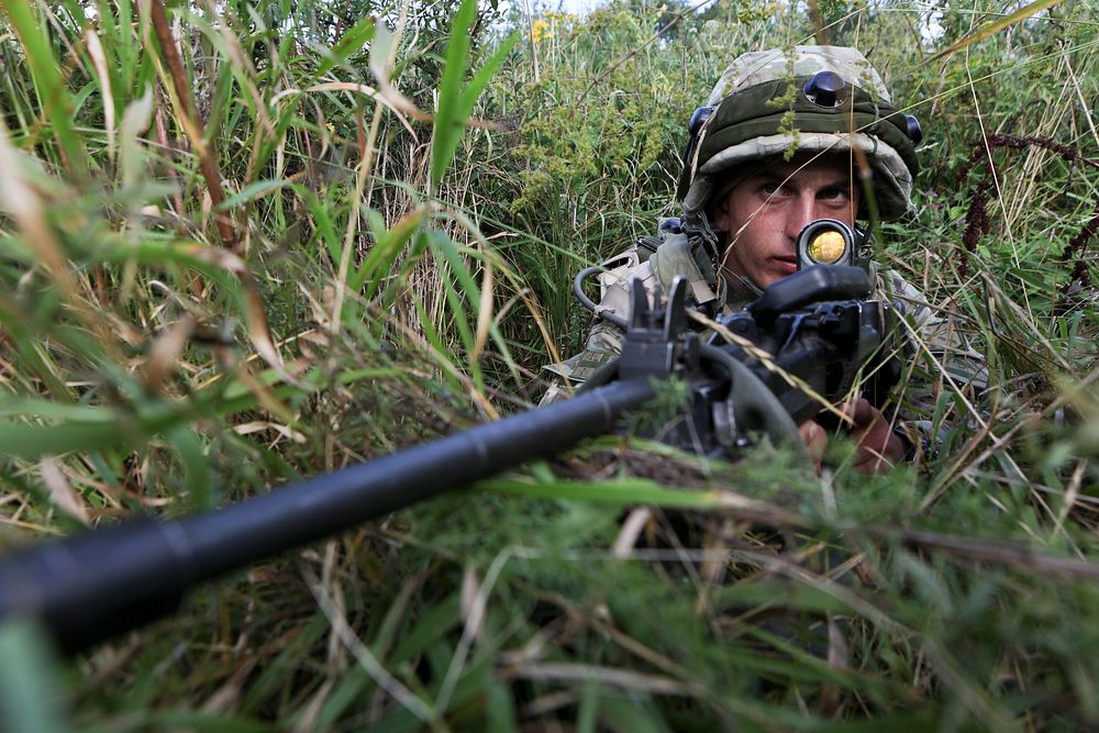 A Georgian soldier with Alpha Company, 31st Light Infantry Battalion provides security at the Joint Multinational Readiness…