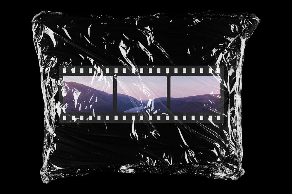 Film strip in plastic, black background