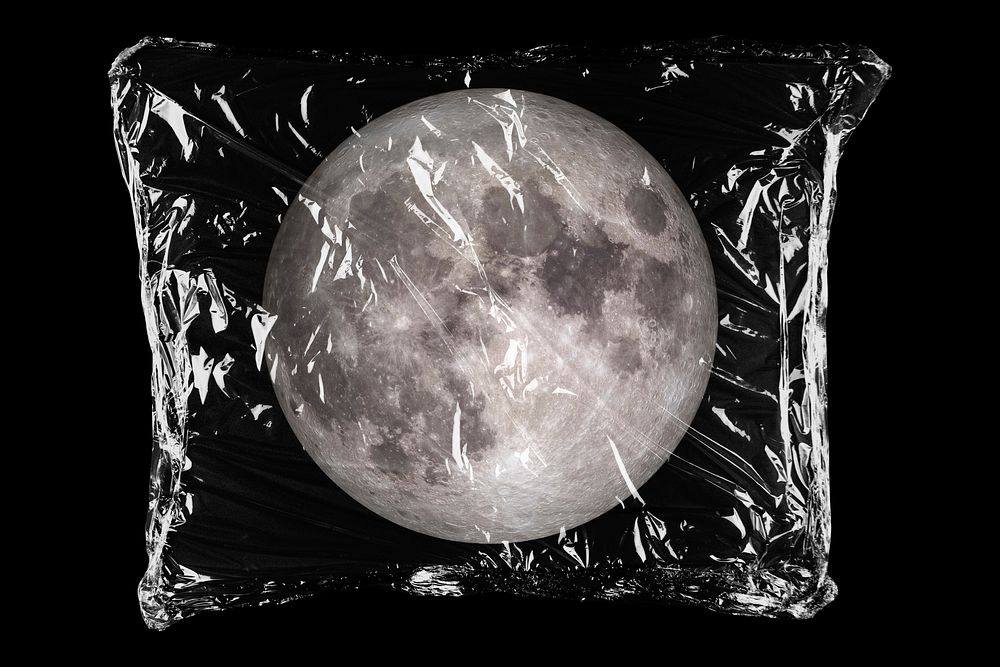 Full moon in plastic, black background