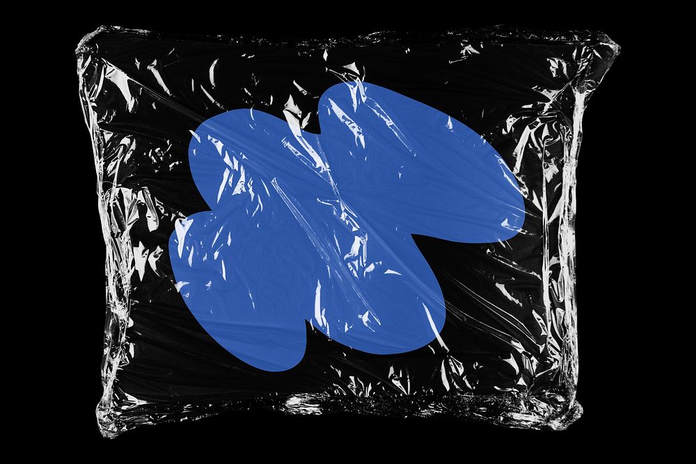 Blue shape in plastic, black background