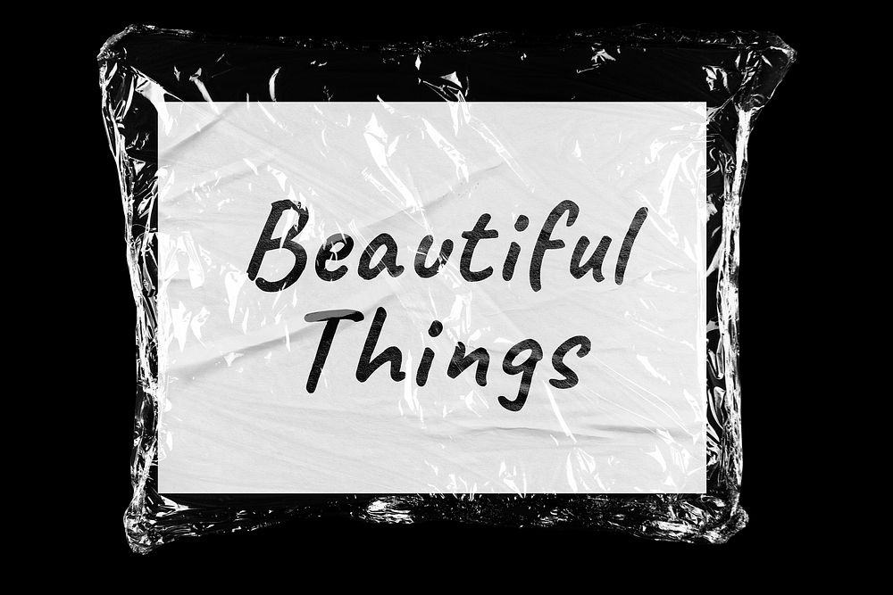 Beautiful things plastic covered handwritten message, black background