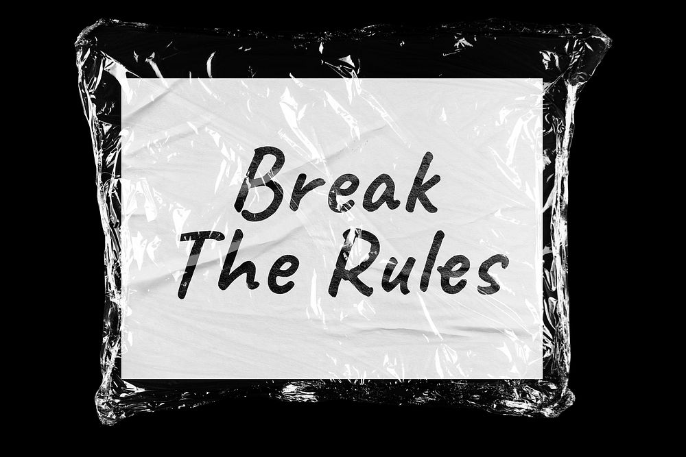 Break the rules plastic covered handwritten quote, black background