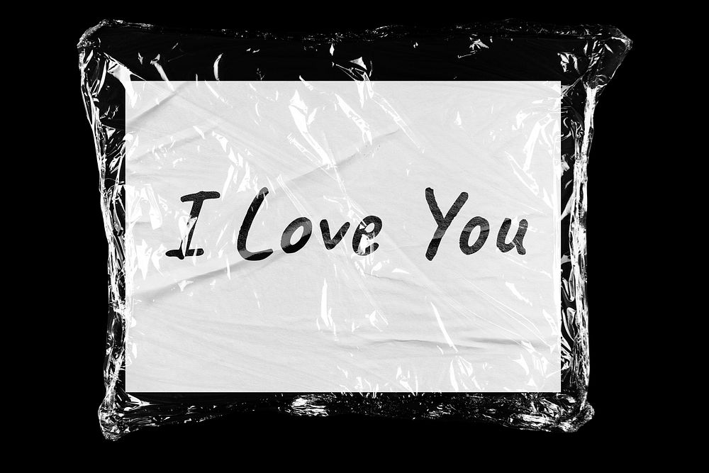 I love you plastic covered handwritten message, black background