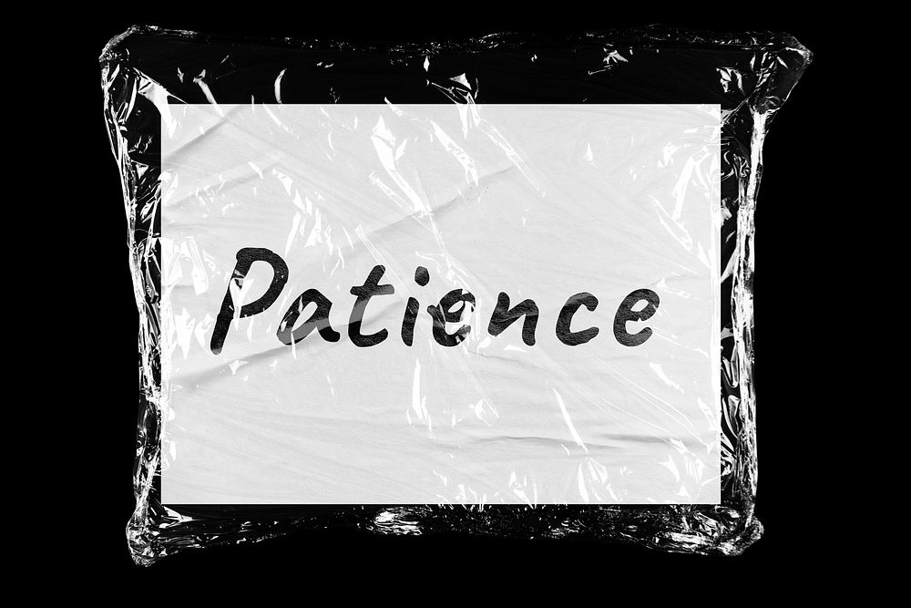 Patience plastic covered handwritten message, black background