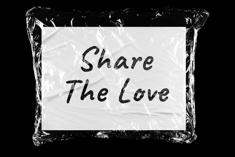 Share the love plastic covered handwritten quote, black background